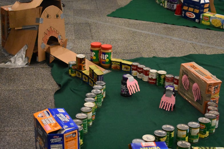 Underwater-themed Putt-Putt course designed by students in the Summer Leadership Program at Blue | Putt Putt for a Cause: Blue's SLP Donates Food to Local Shelter | Be Concerned Food Pantry