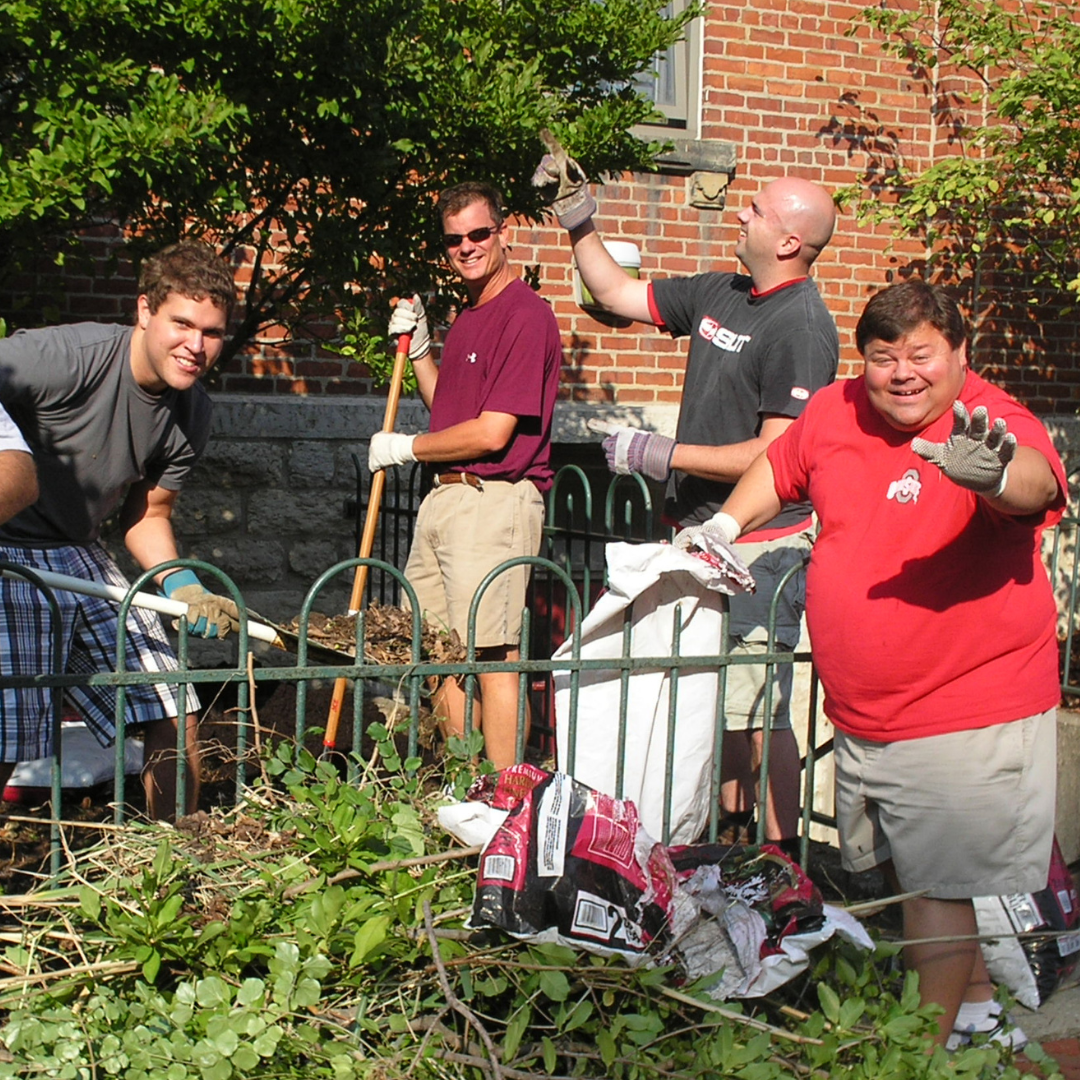Employees in Columbus Ohio do yardwork in the community | Careers Site - Blue Foundation Page