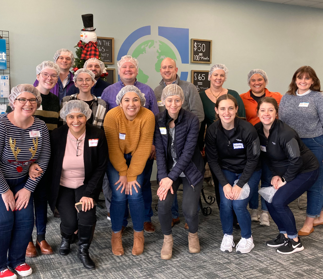 Staff from our Lexington office pose for a photo while out Lexington participating in community service | Careers Site - Blue Foundation Imagery