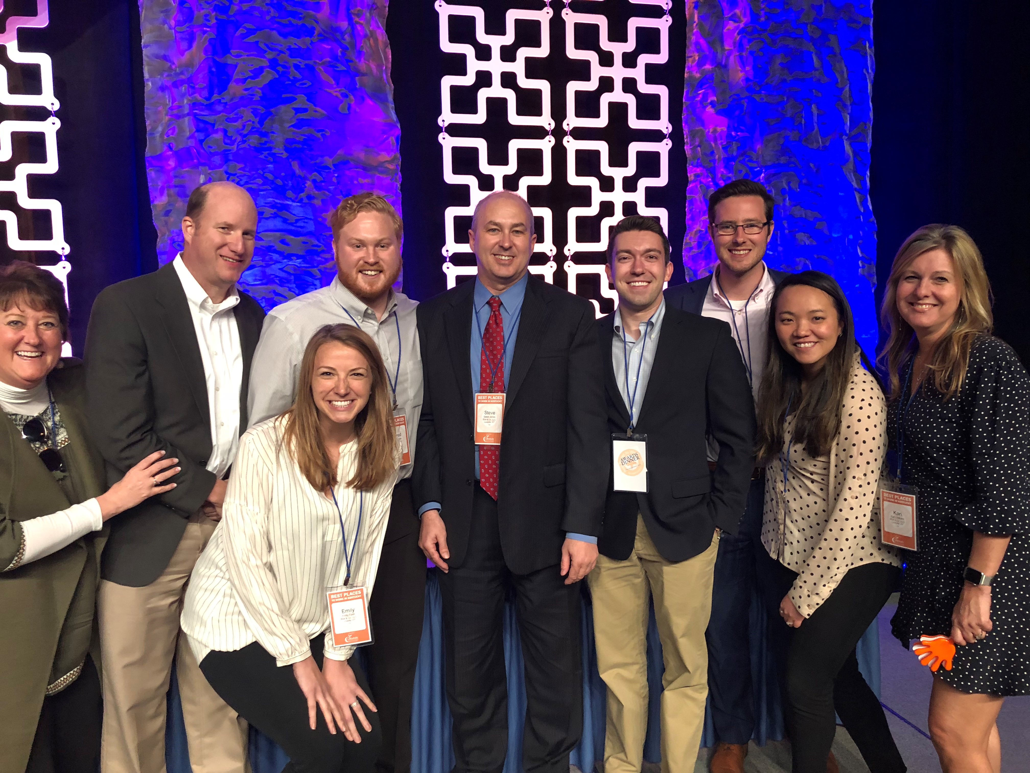 Employees posing together at the Best Places to Work in Kentucky Awards event