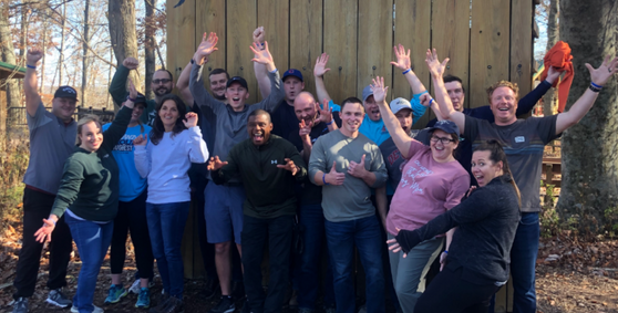 Building Leaders Group taking a fun picture at Camp Joy ropes course